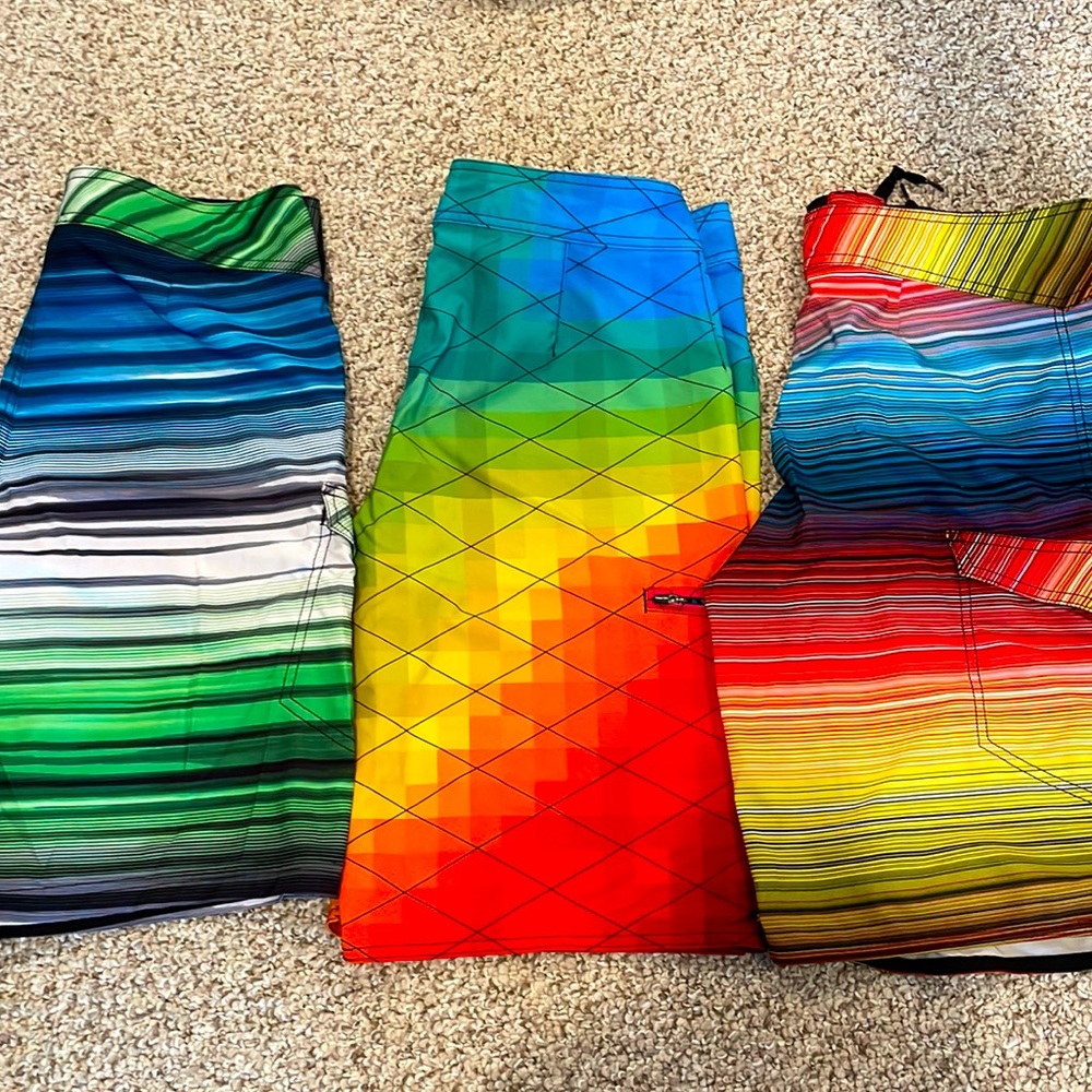 Three Men’s 32” bathing suits.